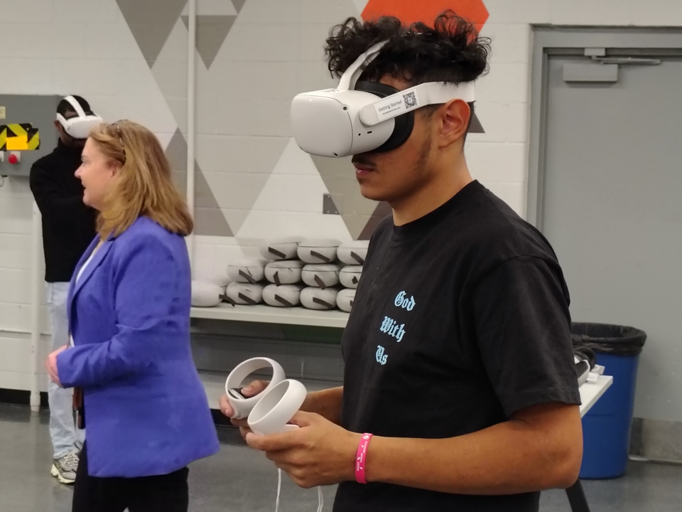  Student Working with Technology at Community Engagement Night